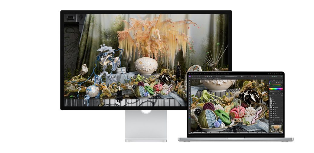 14 英寸 MacBook Pro 和 Studio Display 并排放置，屏幕上展示 Affinity Photo 中的一个项目。