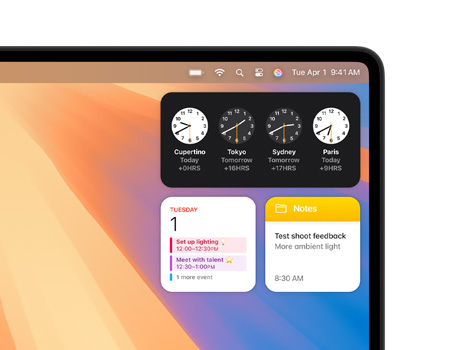 Mac 桌面上显示着各种小组件，包括时钟、日历、备忘录和天气。