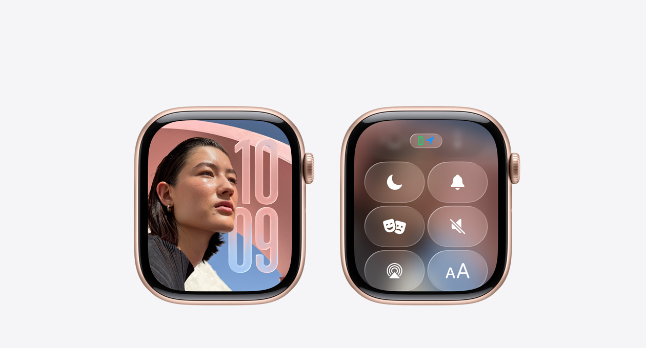 未搭配表带的玫瑰金色 Apple Watch，表盘显示时钟 app，展示 watchOS 26 的全新 Liquid Glass 设计。